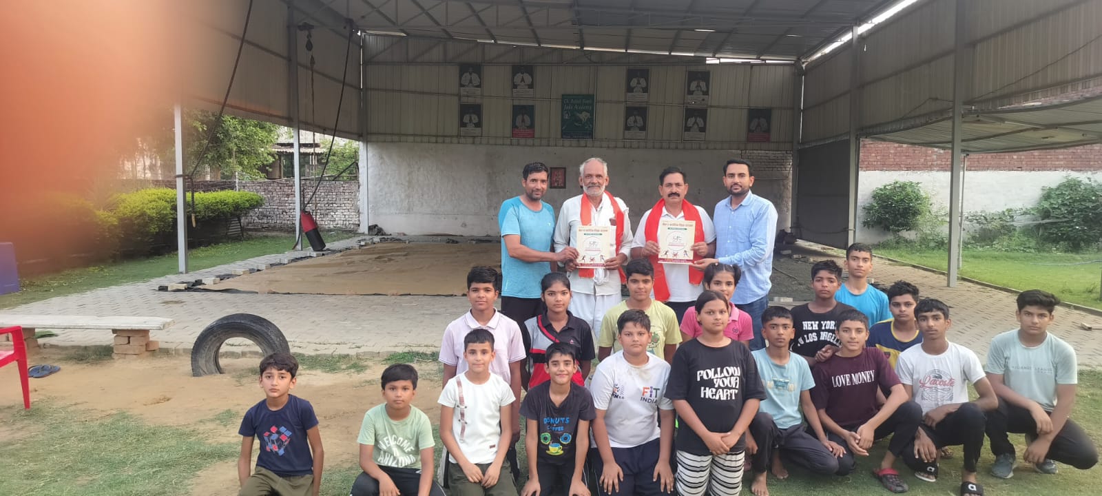 District chapter visit at academy gym with children