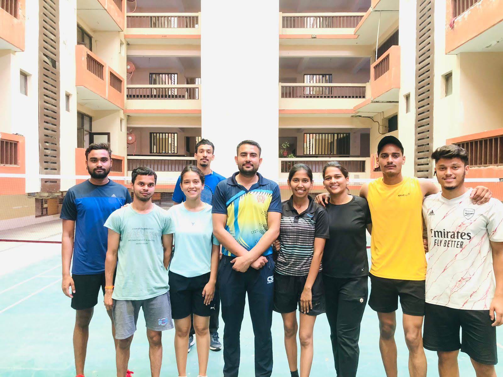 Group meeting on indoor badminton court