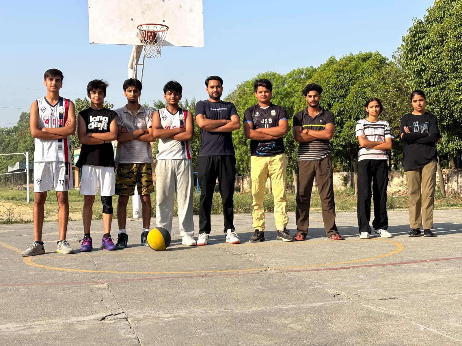Sports PEFB basketball team lineup with founder